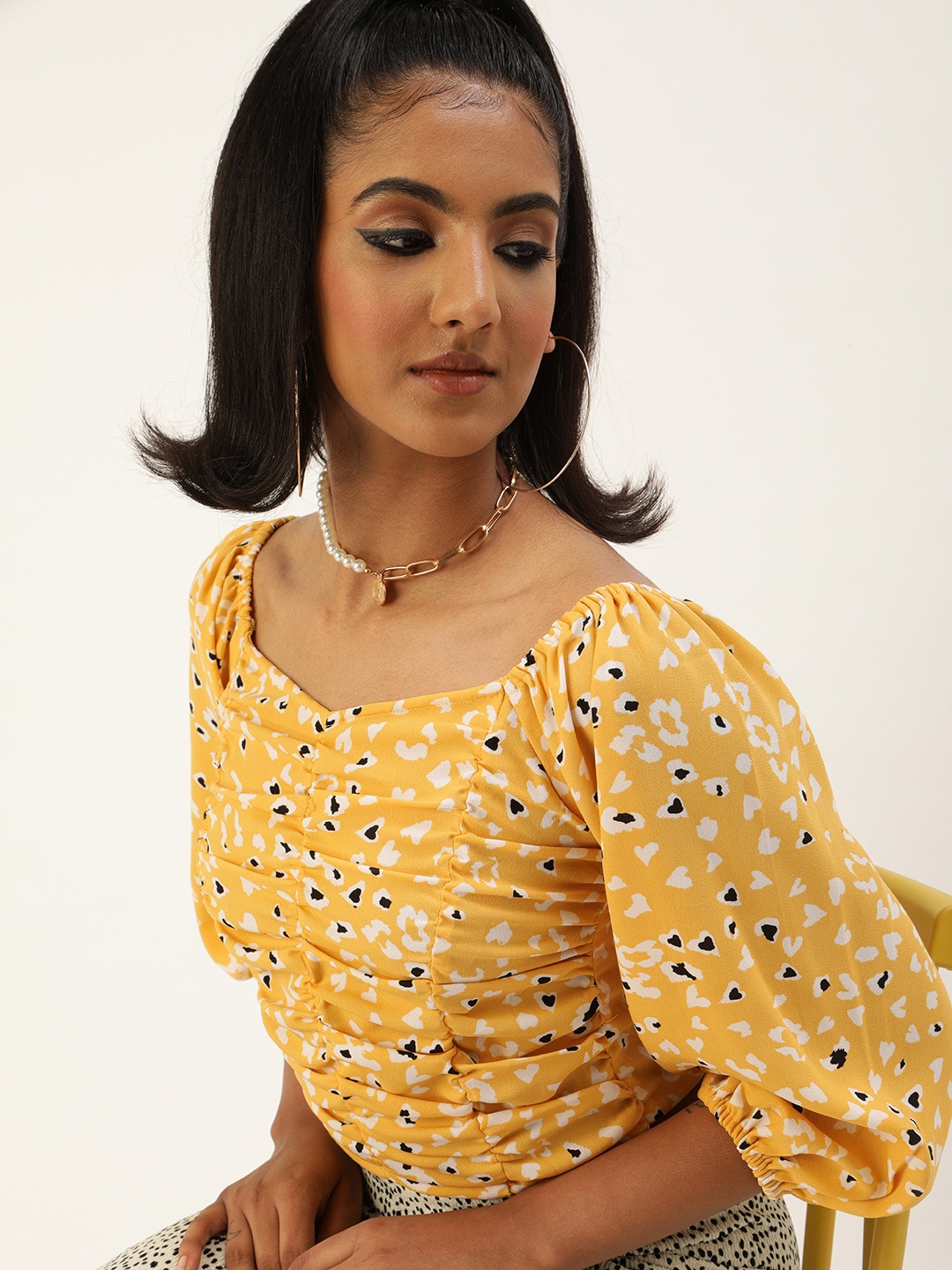 

Antheaa Yellow & Black Printed Puff Sleeves Crepe Regular Crop Top