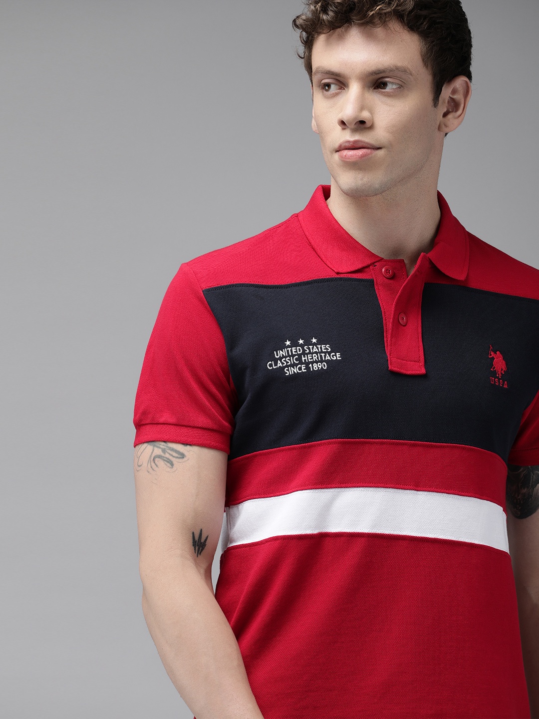 

U.S. Polo Assn. Men Red Navy Blue Colourblocked Polo Collar Pure Cotton T-shirt