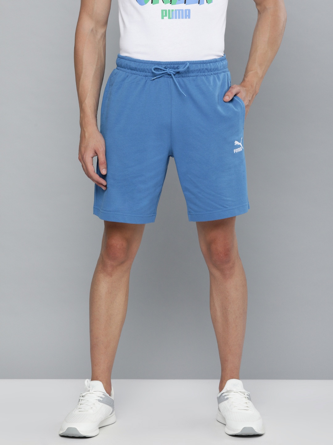 

Puma Men Blue Solid Regular Fit Sports Shorts