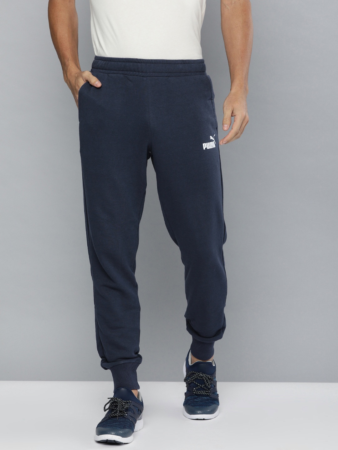 

Puma Men Navy Blue Solid ESS Logo Pants Joggers