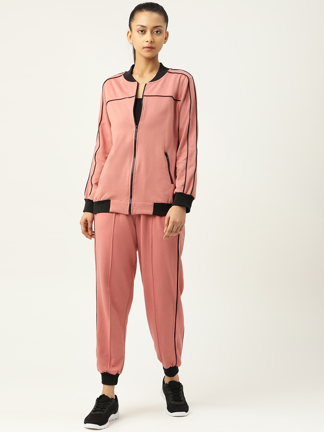 

Laabha Women Dusty Pink Solid Knitted Tracksuits