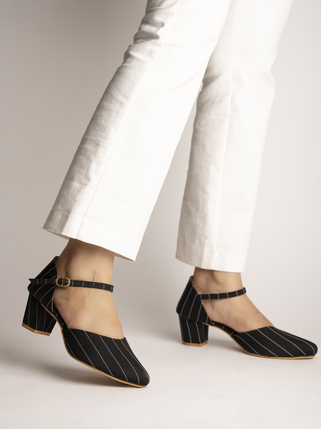 

Shoetopia Women Black Striped Pumps