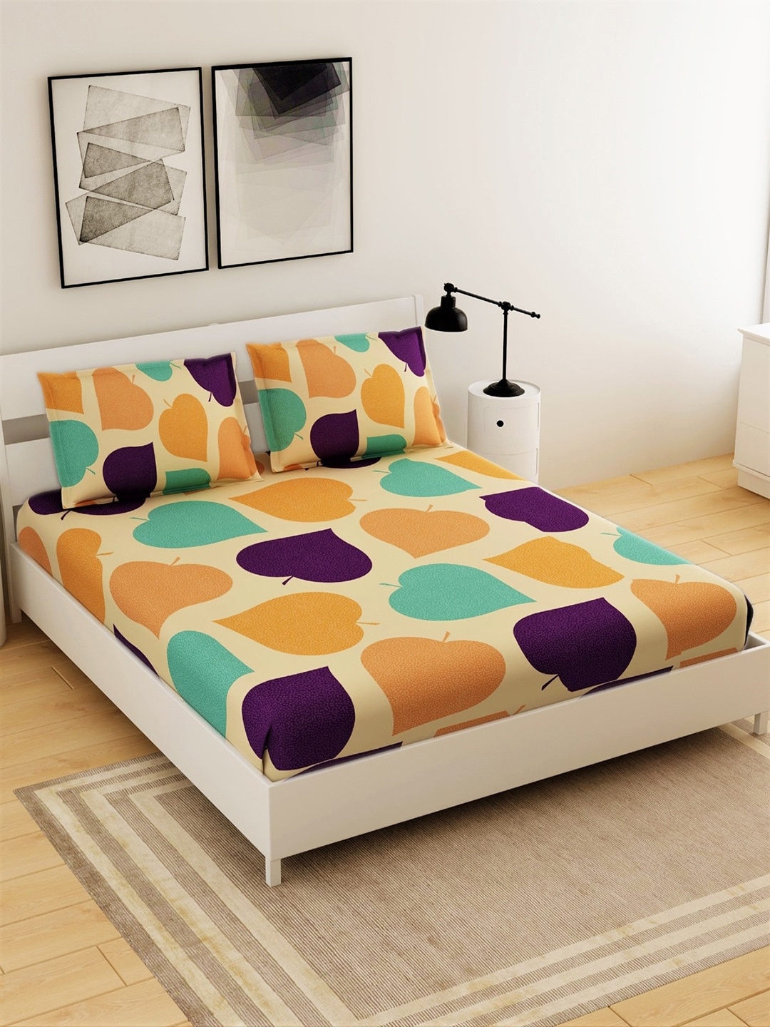 

Salona Bichona Peach-Coloured & Blue Abstract 144 TC Polyester 1 Queen Bedsheet with 2 Pillow Covers