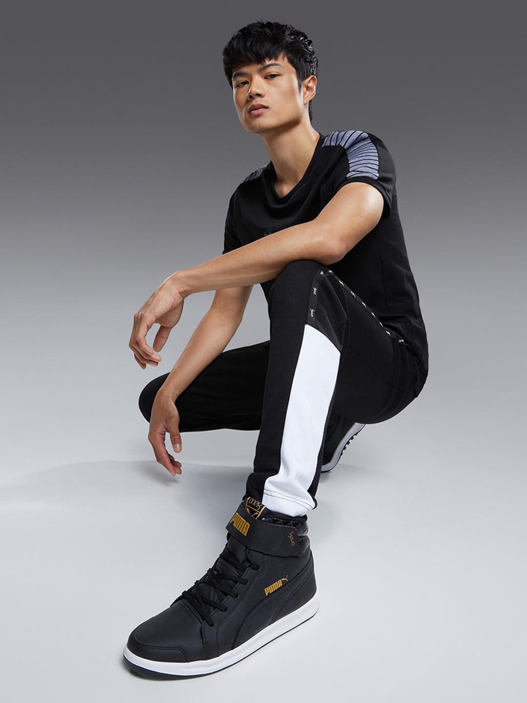 

one8 x PUMA Unisex Black One8 Prime Mid V3 Sneakers