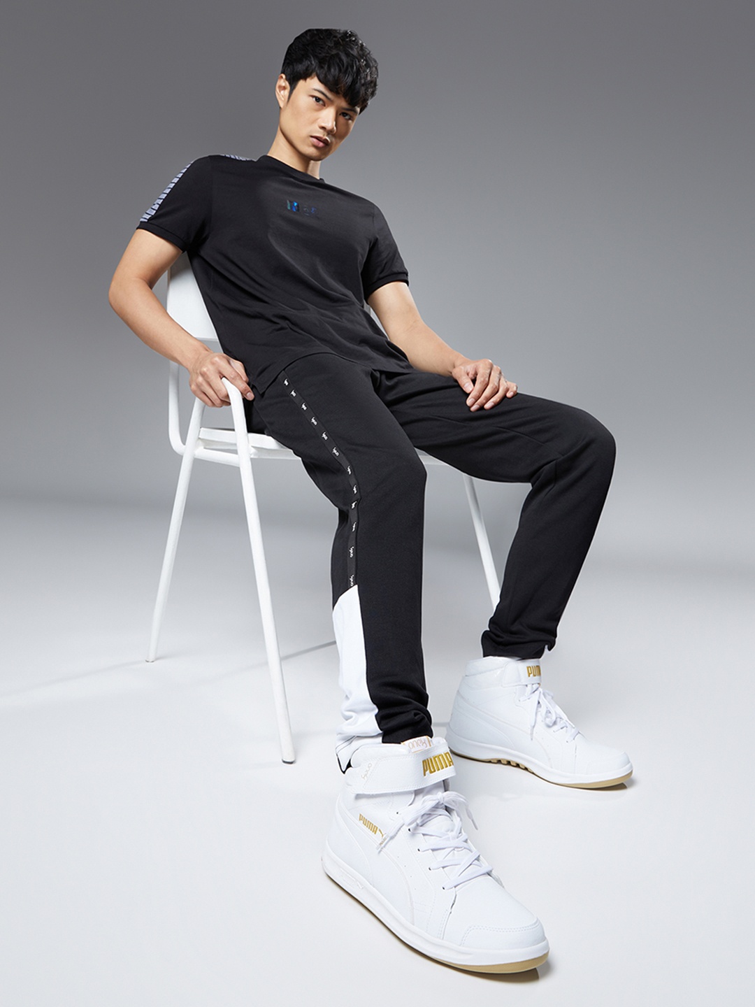 

one8 x PUMA Unisex White One8 Prime Mid V3 Sneakers