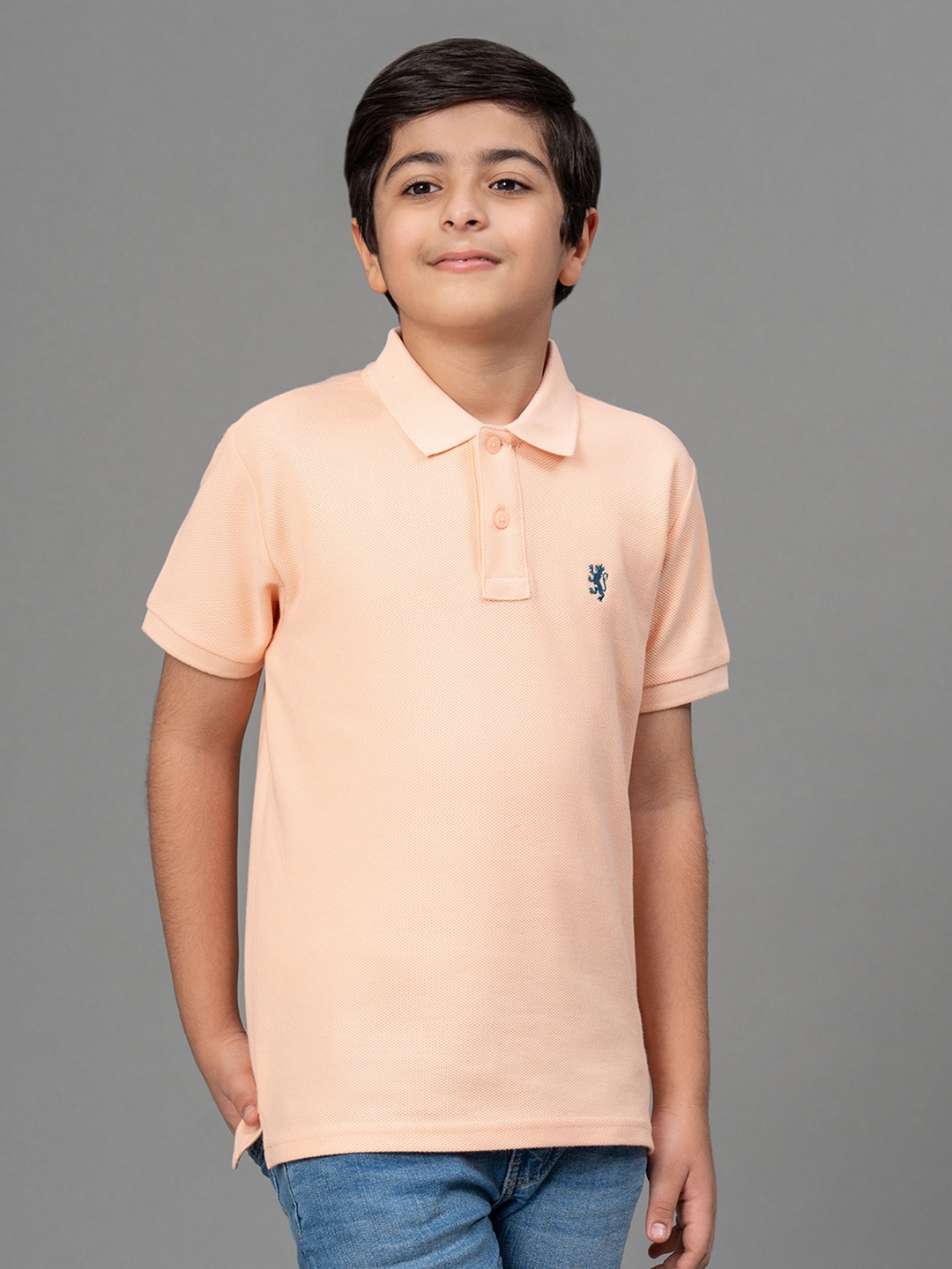 

Red Tape Boys Peach-Coloured Self Design Polo Collar T-shirt