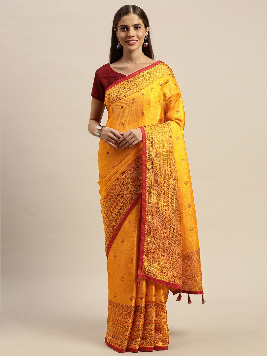 

Rajnandini Yellow & Red Jute Silk Embellished Patola Saree
