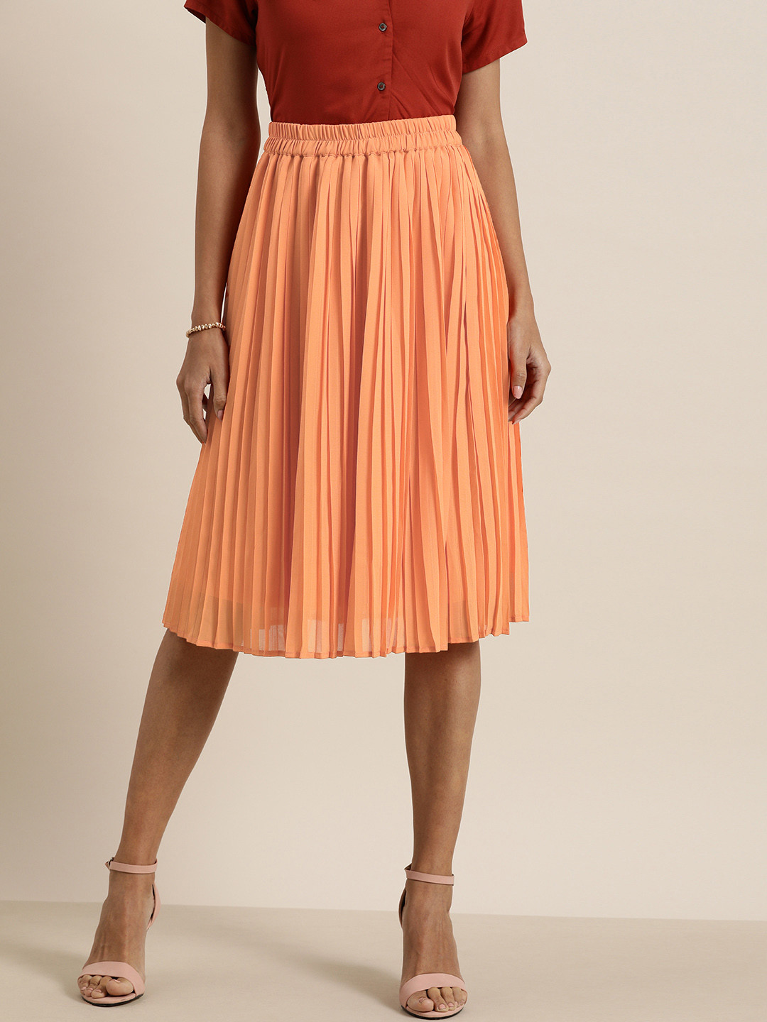 

all about you Women Coral Orange Solid Accordion Pleated A-Line Skirt