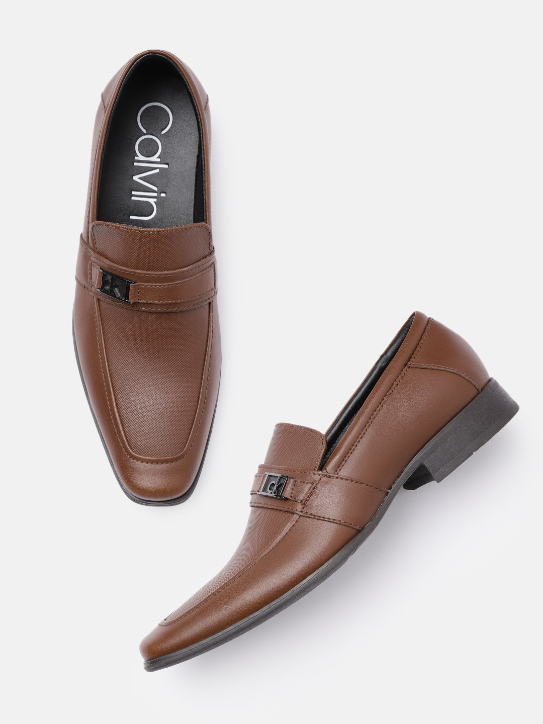 

Calvin Klein Men Brown Solid Loafers