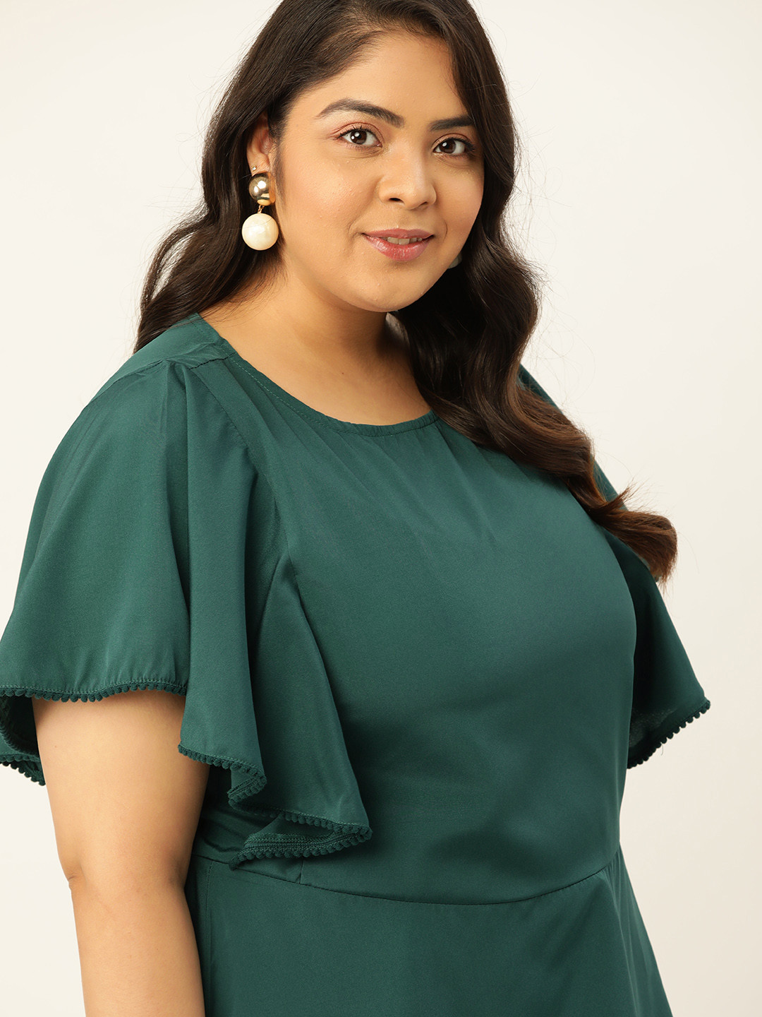 

Sztori Women Plus Size Green Flutter Sleeve Solid Regular Top