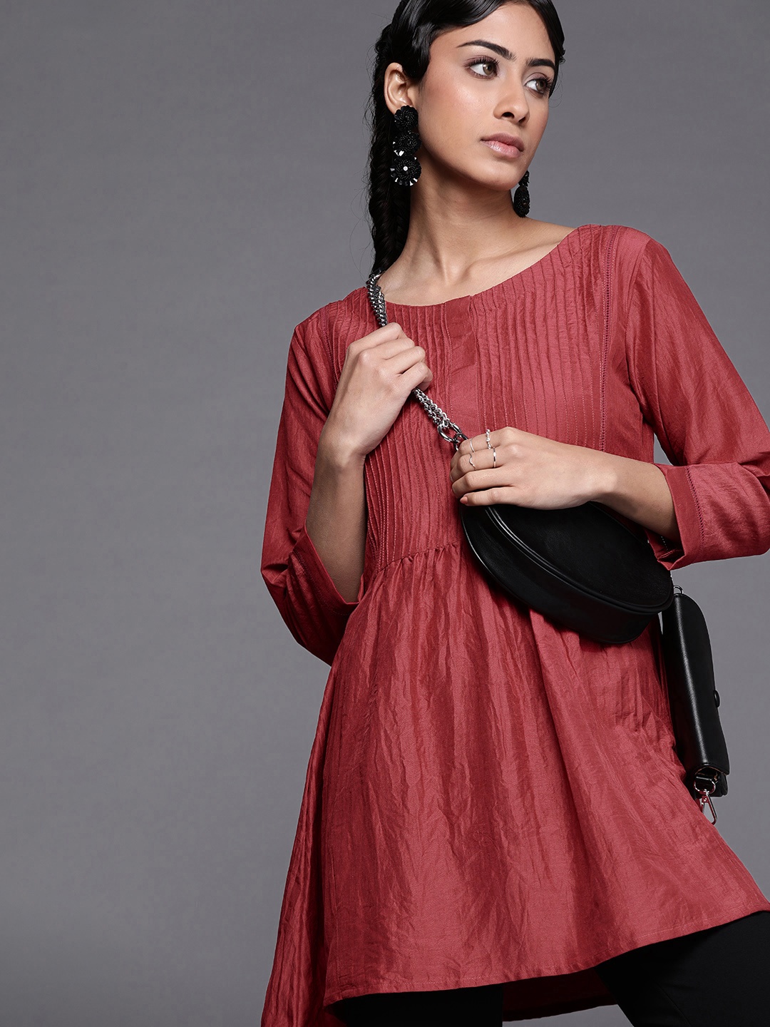 

Inddus Women Maroon Solid Tunic Tunic