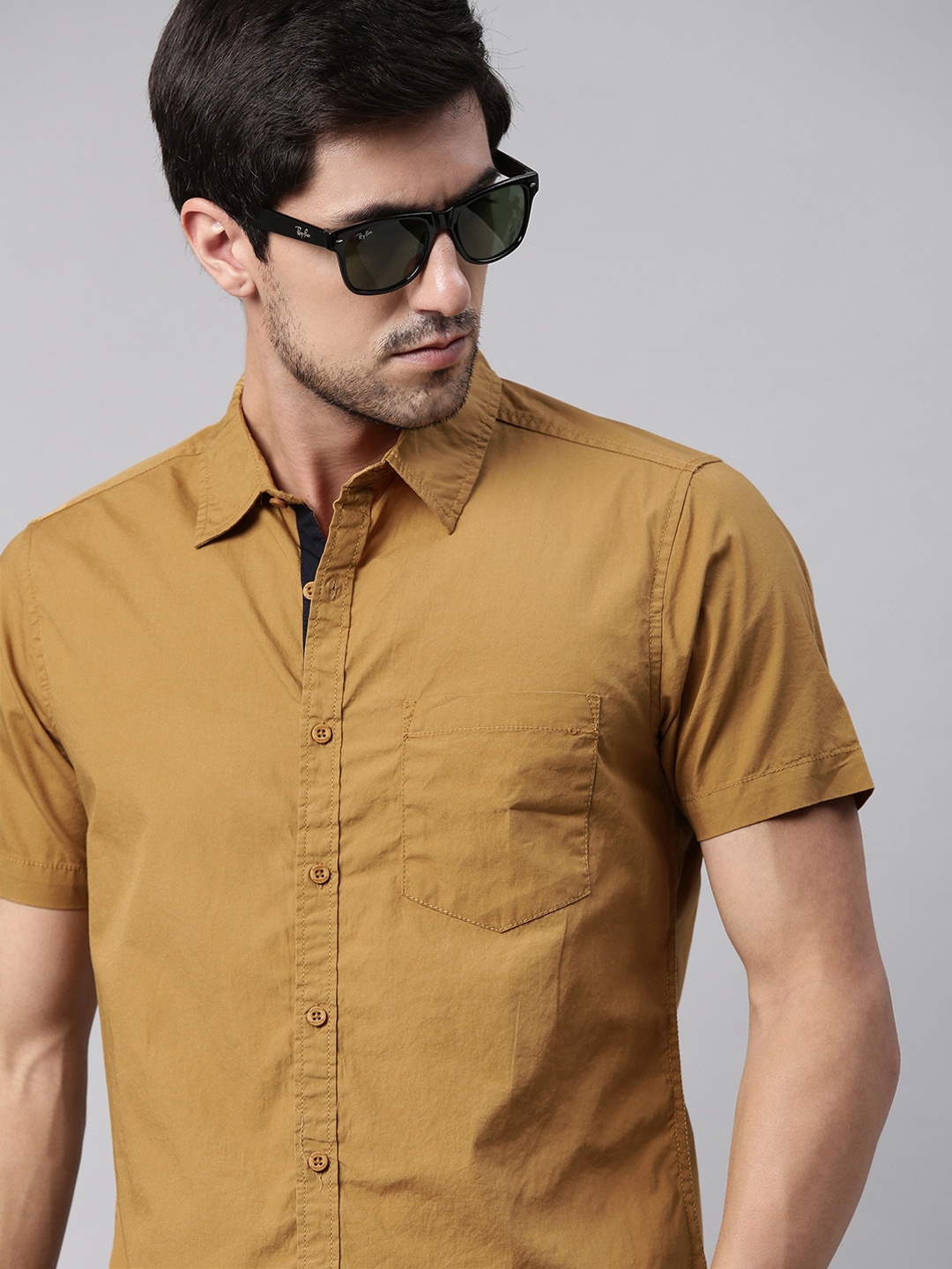 

Roadster Men Khaki Regular Fit Solid Sustainable Casual Shirt