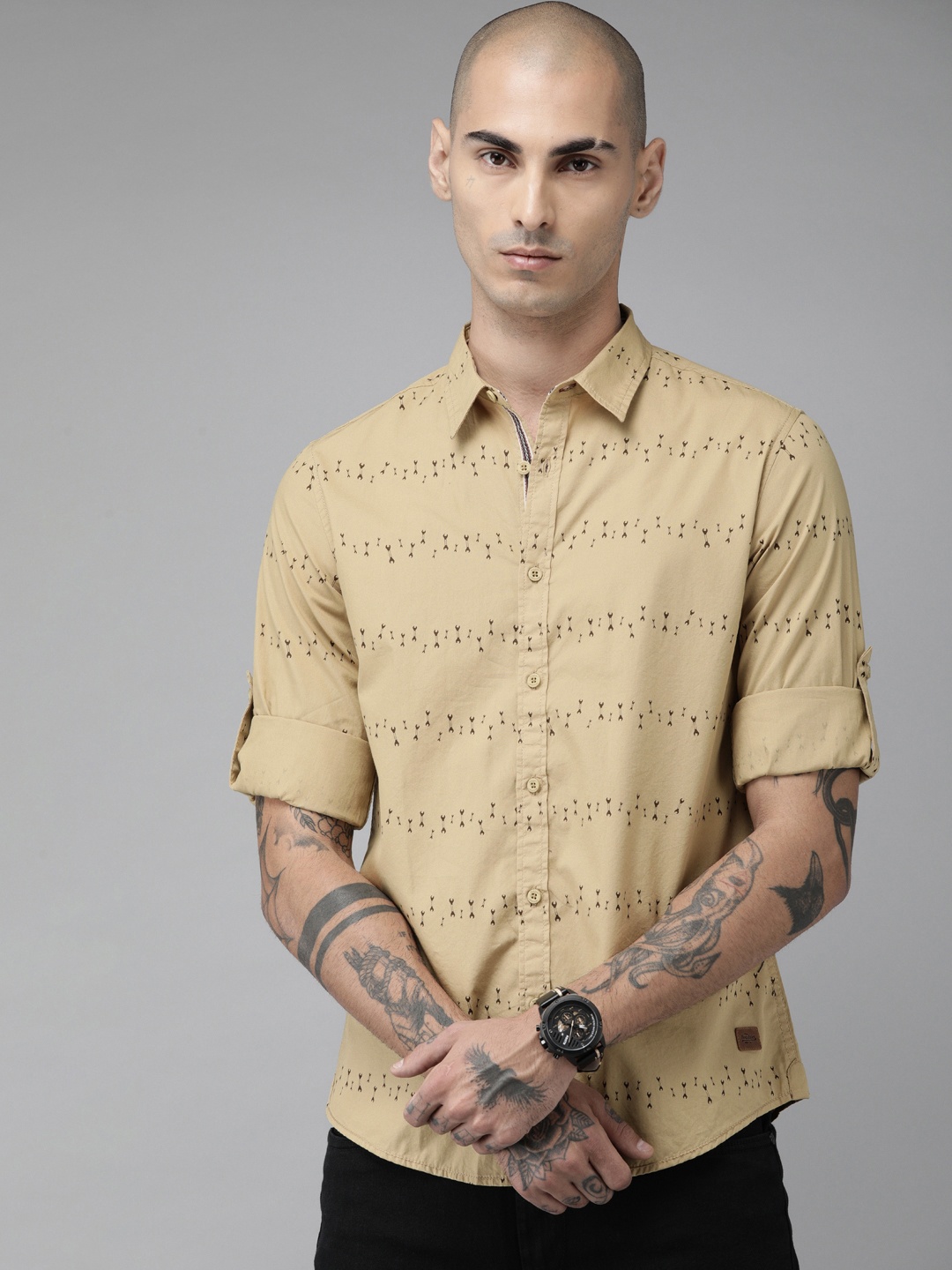 

The Roadster Lifestyle Co Men Beige & Brown Regular Fit Printed Casual Shirt
