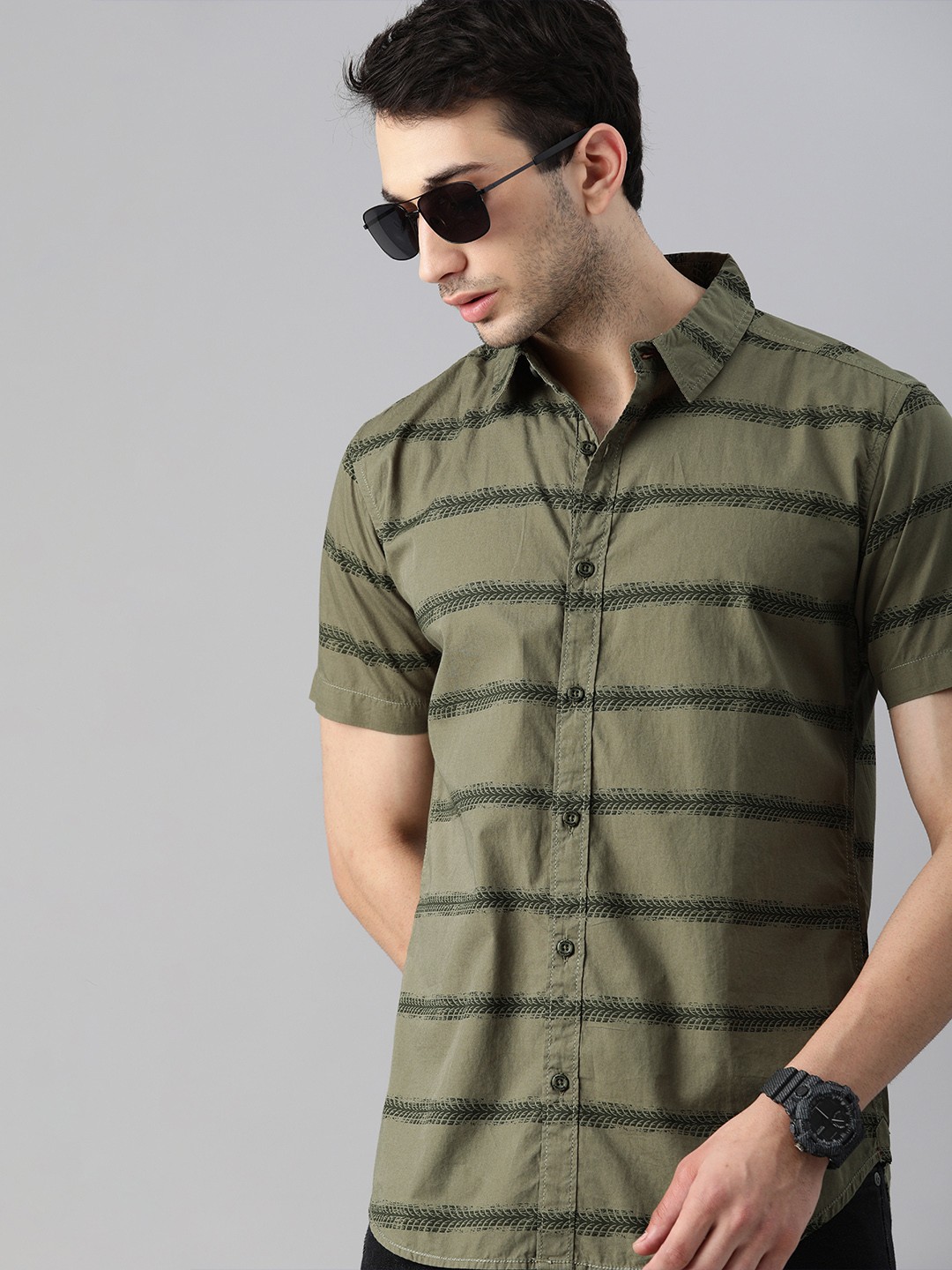 

The Roadster Lifestyle Co Men Olive Green Horizontal Stripes Casual Shirt