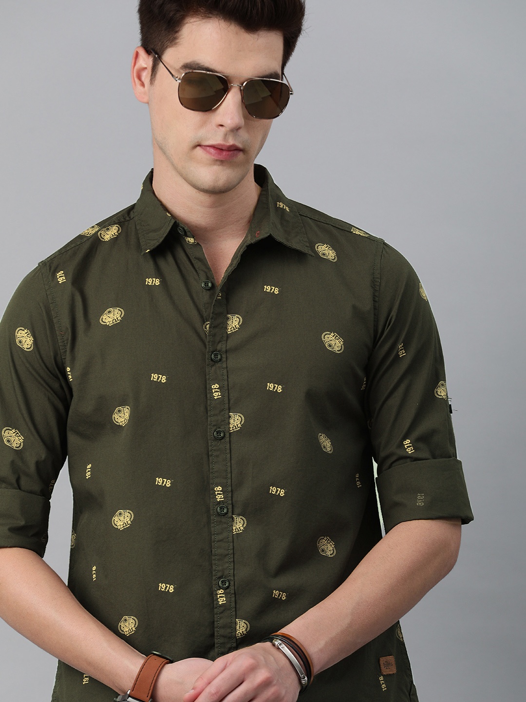 

The Roadster Lifestyle Co Men Olive Green Printed Casual Shirt