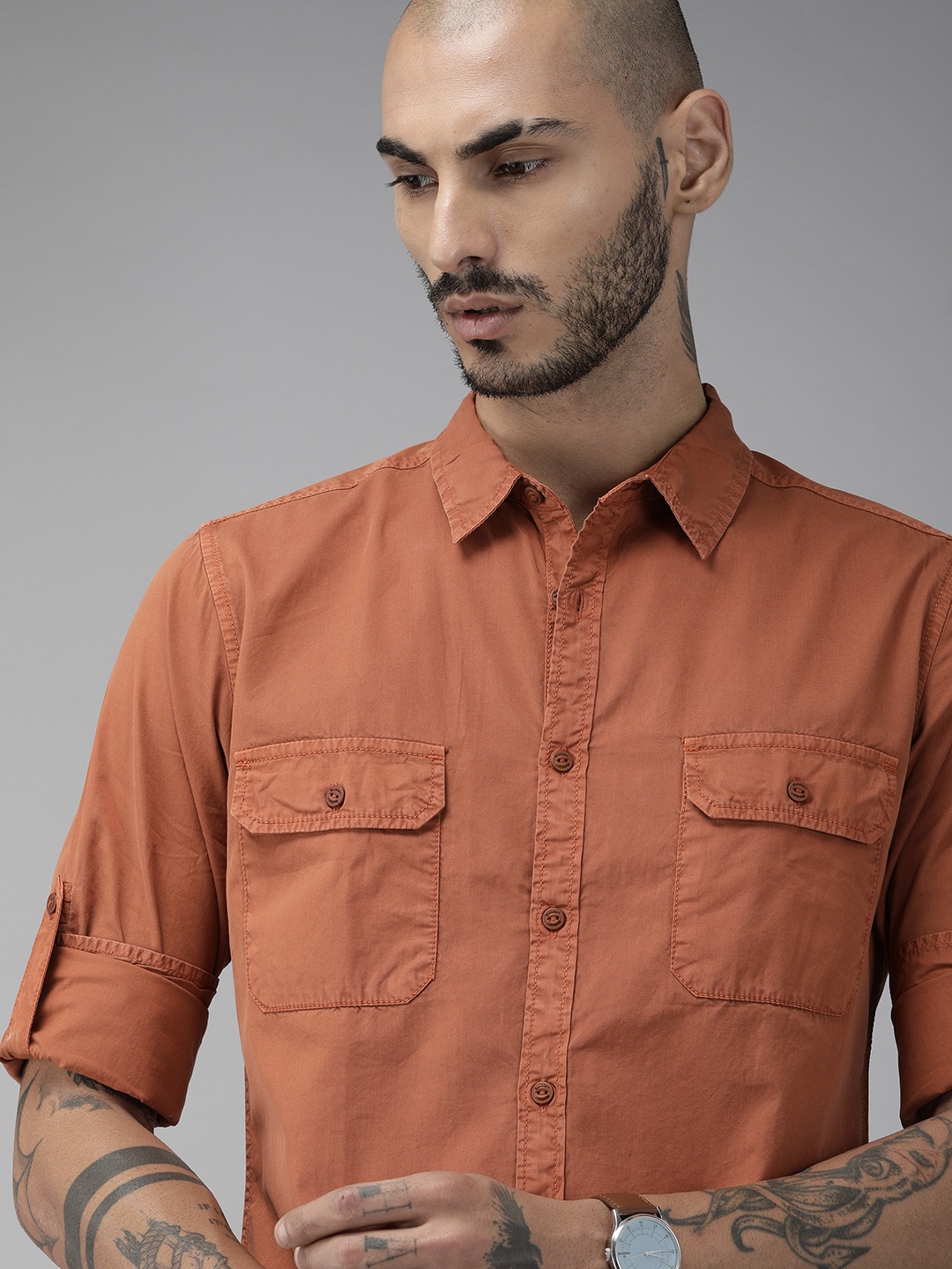 

The Roadster Lifestyle Co Men Rust Orange Regular Fit Solid Casual Shirt