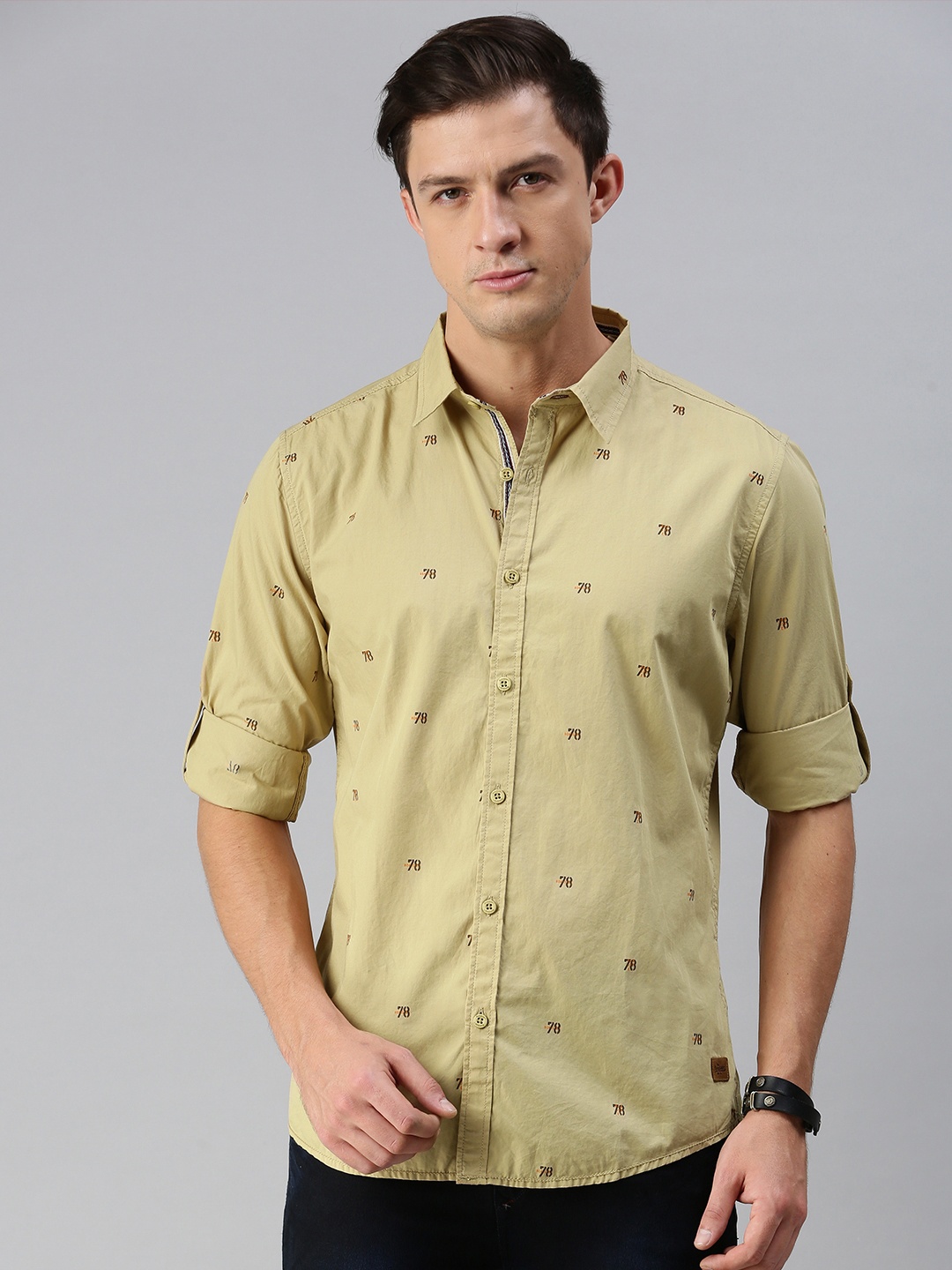 

The Roadster Lifestyle Co Men Beige & Brown Printed Casual Shirt
