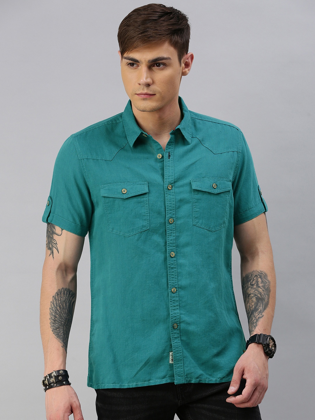 

The Roadster Lifestyle Co Men Teal Regular Fit Solid Casual Shirt