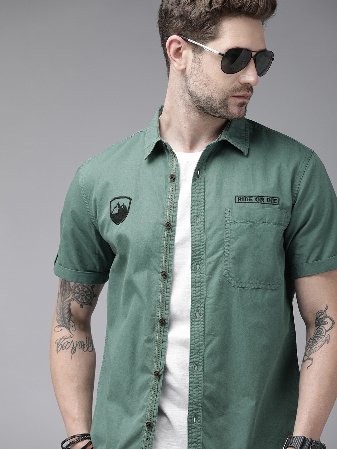 

The Roadster Lifestyle Co Men Teal Green Casual Shirt