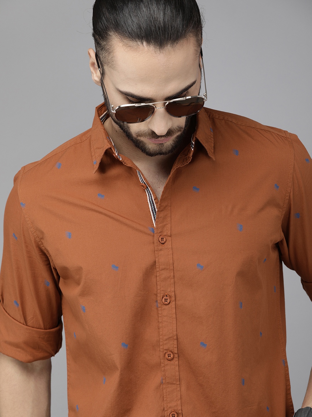 

The Roadster Lifestyle Co Men Rust Orange Ditsy Printed Casual Shirt