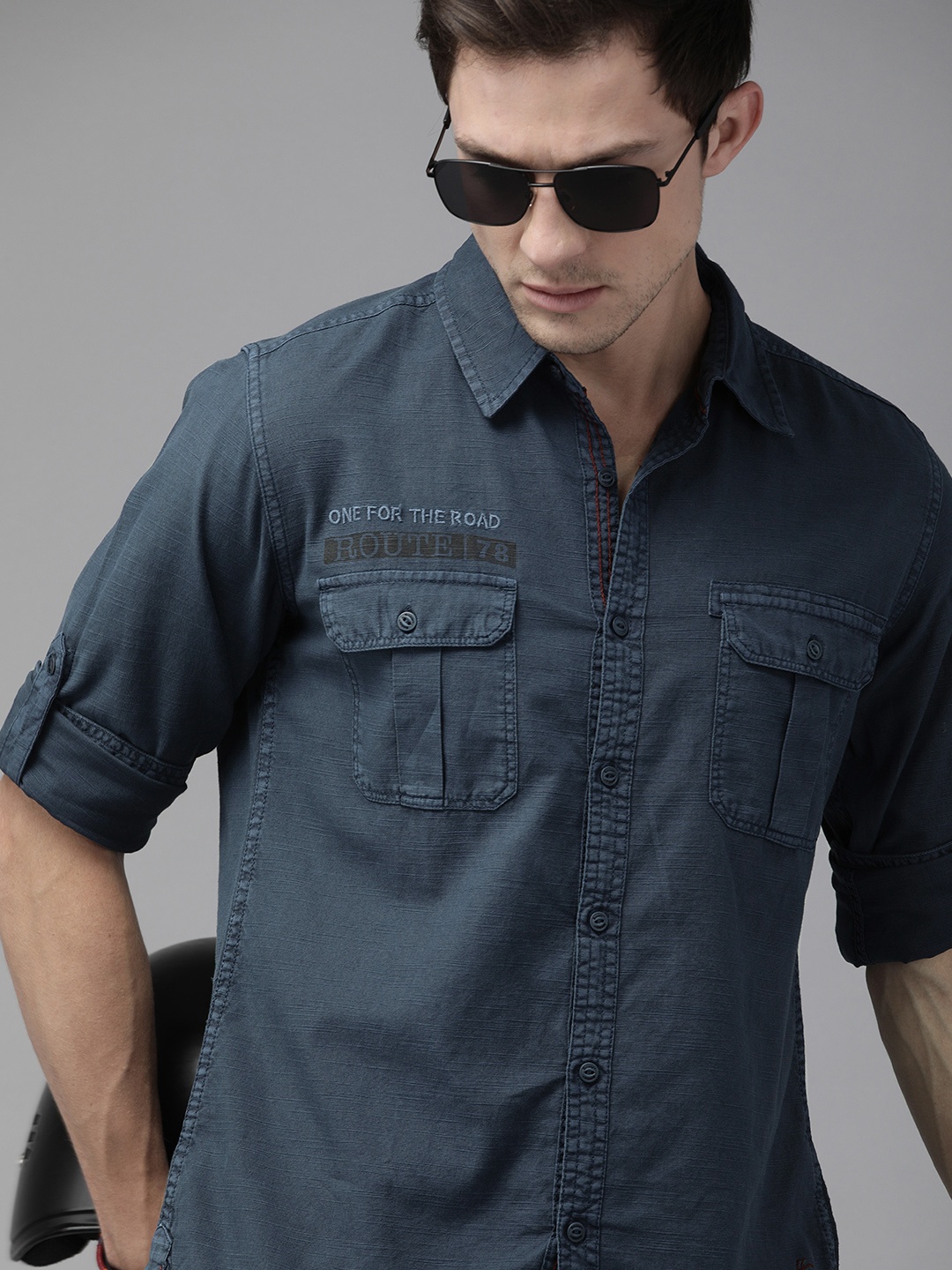 

The Roadster Lifestyle Co Men Navy Blue Solid Casual Pure Cotton Shirt with Embroidery