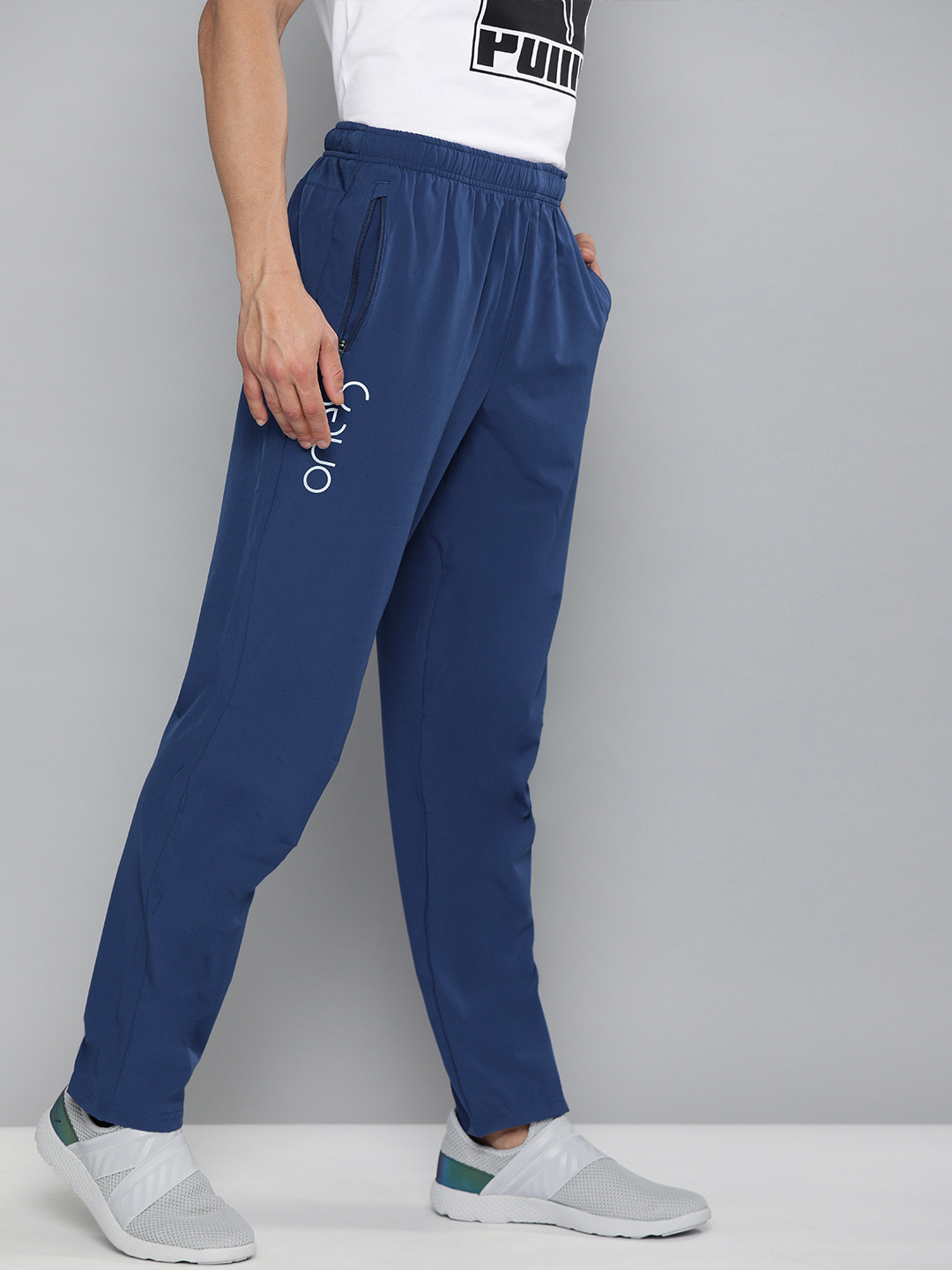 

one8 x PUMA Men Teal Blue Slim Fit Solid VK Active Pants