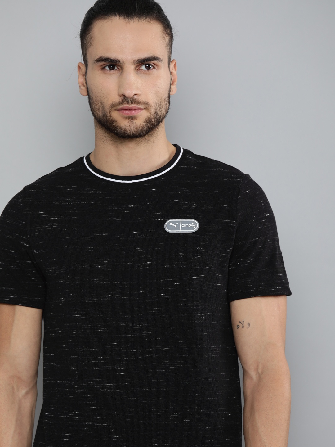 

one8 x PUMA Men Slim Fit Solid Round Neck VK Elevated Pique T-shirt, Black