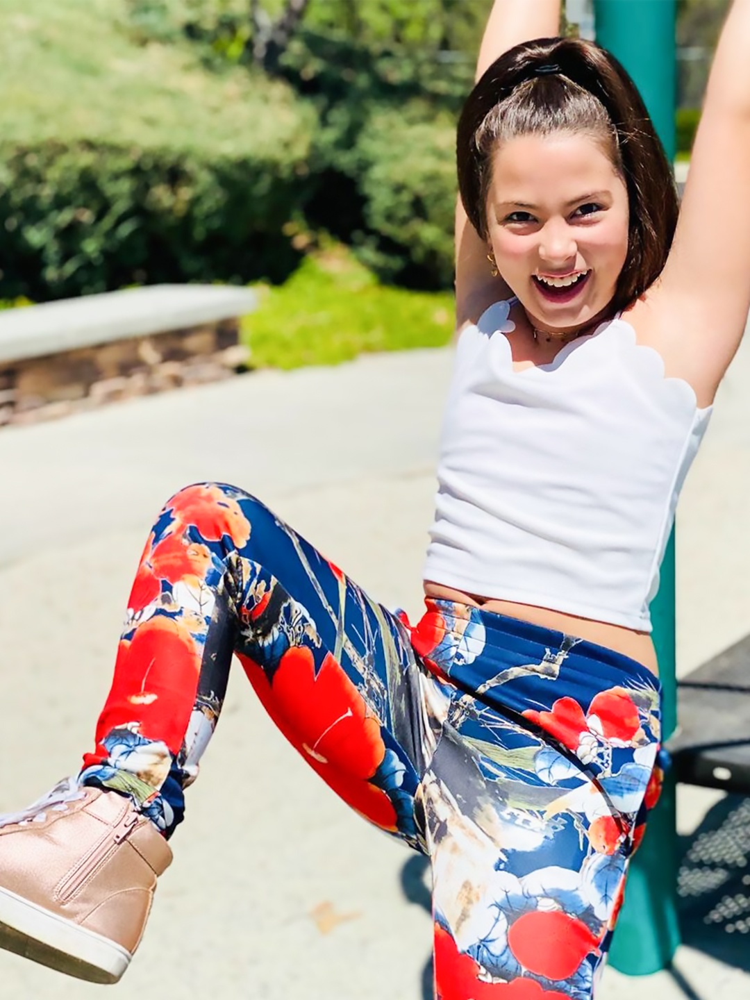 

Cherry Crumble Girls Navy Blue & Red Floral Printed Treggings