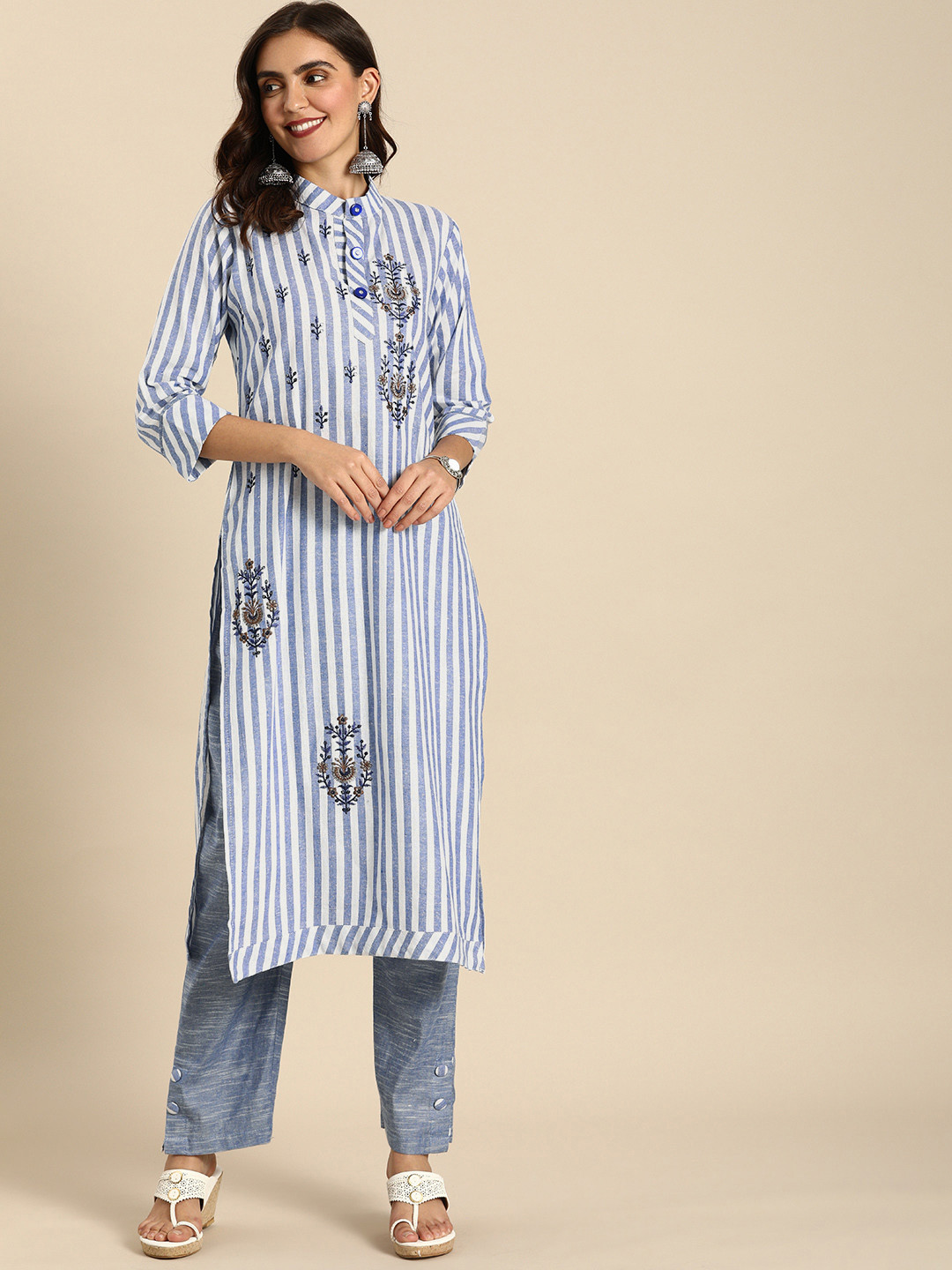 

Rajnandini Women White Embroidered Regular Thread Work Pure Cotton Kurta with Trousers