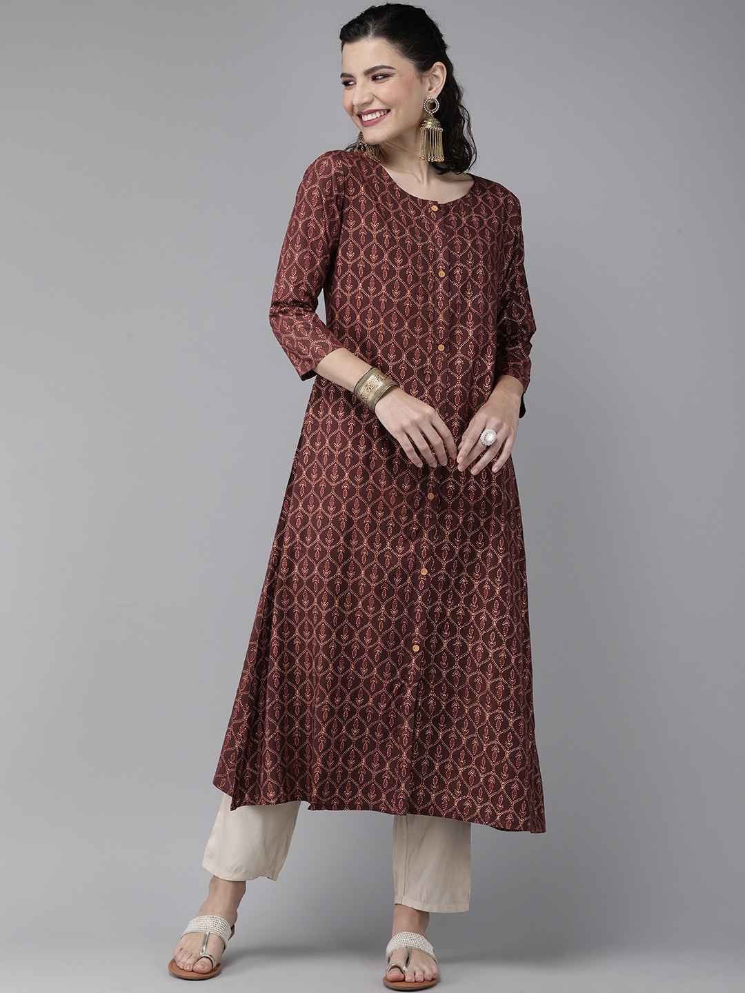 

Indo Era Women Burgundy & Golden Ethnic Motifs Foil Print A-Line Kurta