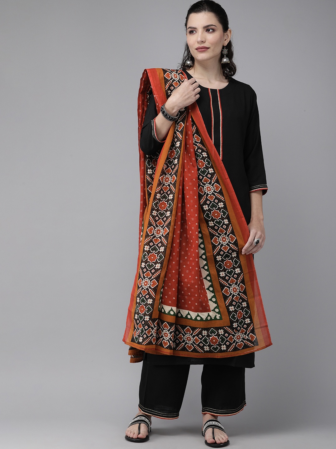 

Indo Era Women Black & Red Solid Kurta with Palazzos & Dupatta