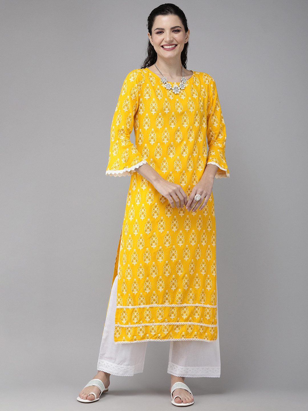 

Indo Era Women Yellow & White Ethnic Motifs Printed Flared Sleeves Kurta