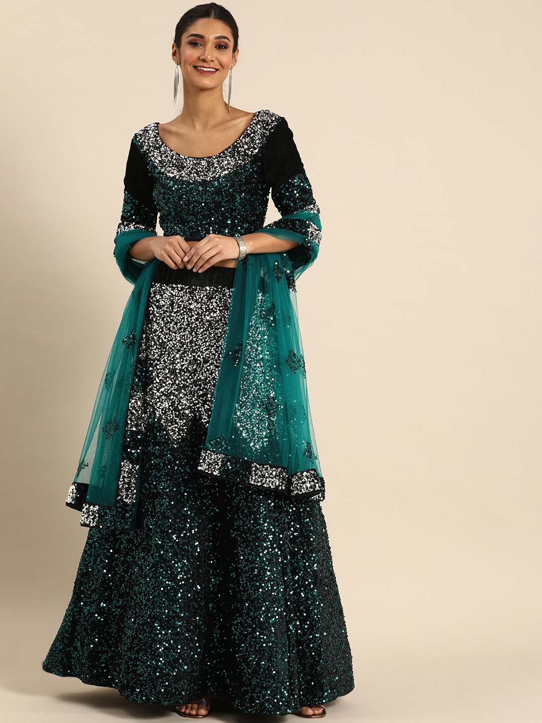 

Shaily Black & Teal Green Semi-Stitched Lehenga & Unstitched Blouse with Dupatta