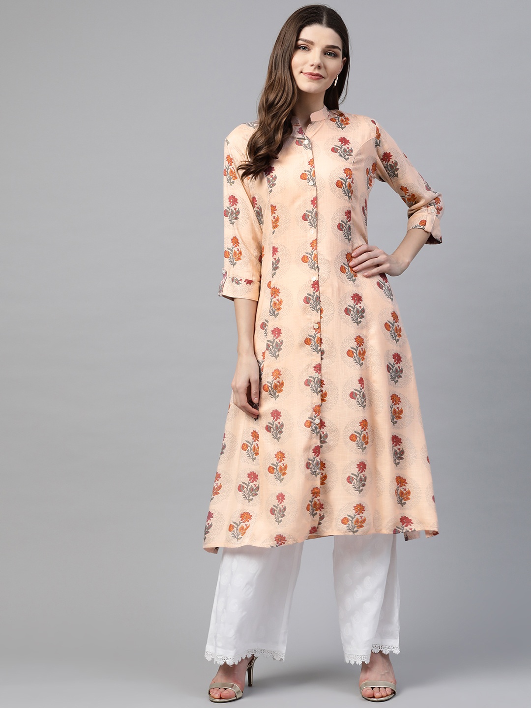 

Divena Women Peach-Coloured & Coral Orange Ethnic Motifs Printed A-Line Kurta