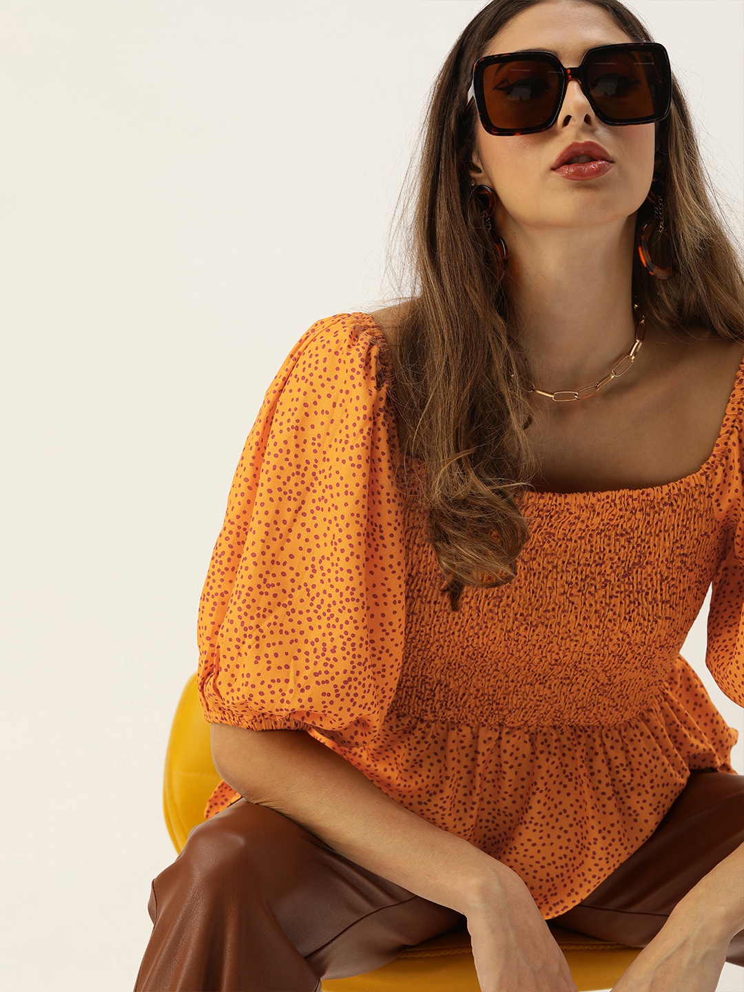 

Faballey Yellow & Red Printed Dotted Smocked Regular Top