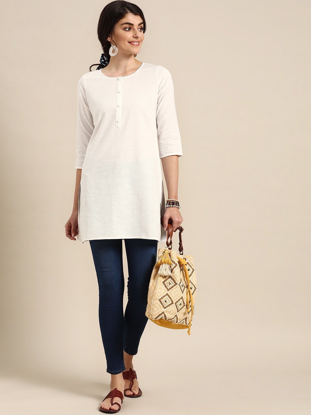 

Prakrti Women White Solid Pure Cotton Kurti