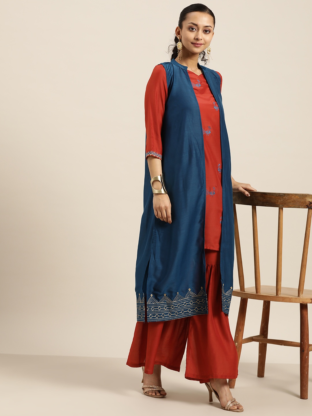 

Sangria Women Rust Brown & Blue Embroidered Kurta with Sharara & Jacket
