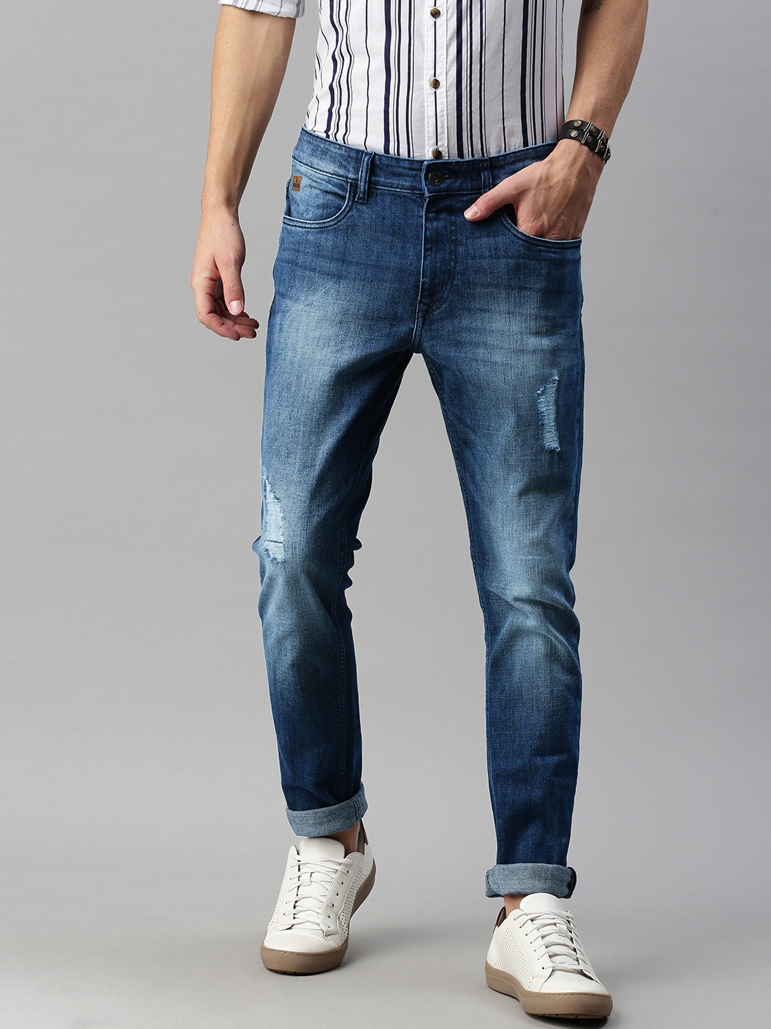 

WROGN Men Blue Slim Fit Mildly Distressed Heavy Fade Stretchable Jeans