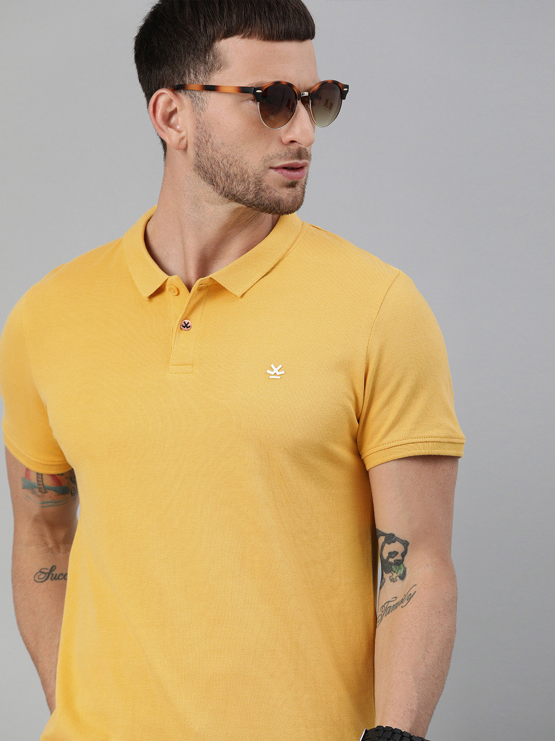 

WROGN Men Yellow Solid Pure Cotton Polo Collar Pure Cotton T-shirt