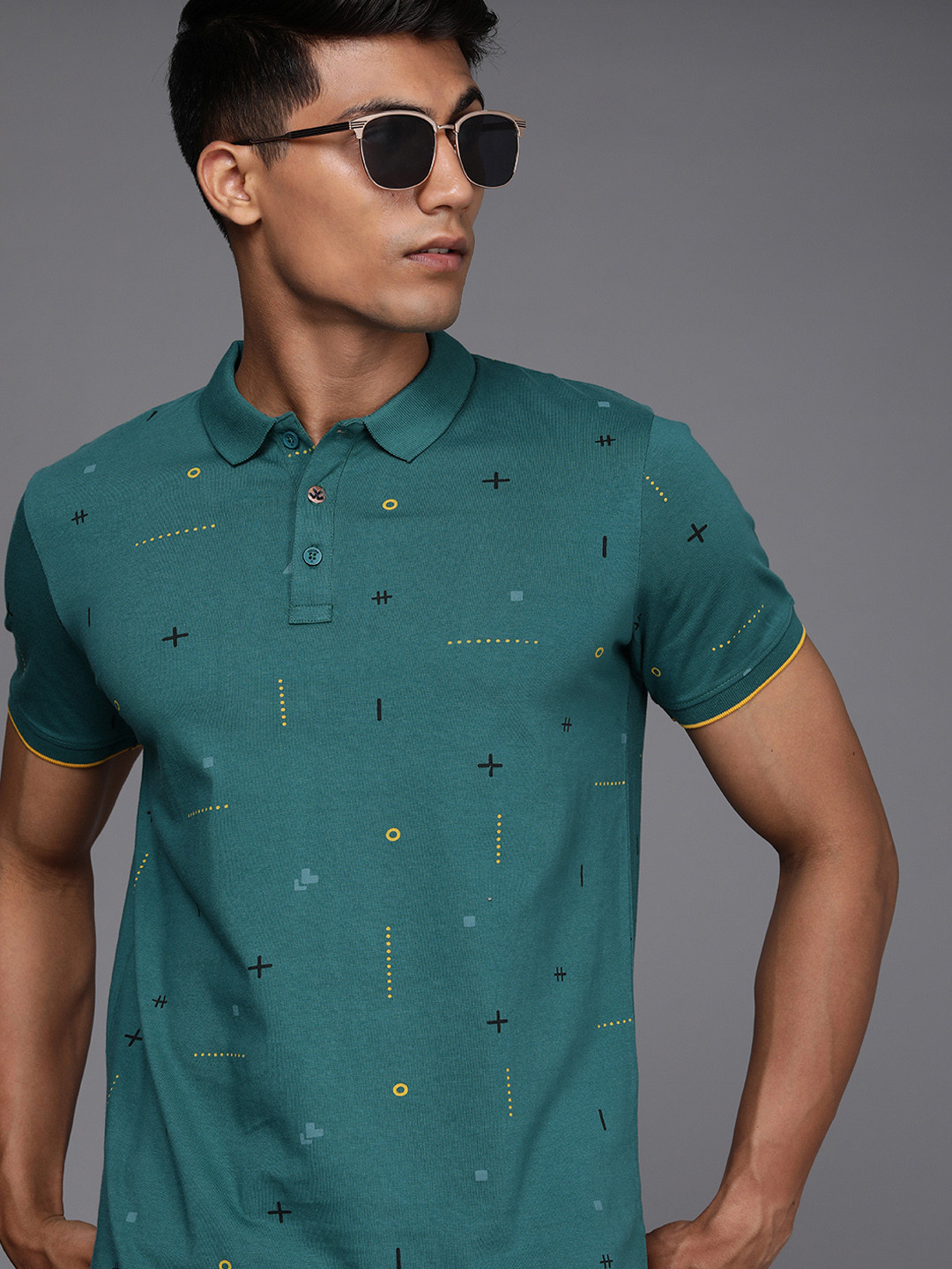 

WROGN Men Teal & Black Printed Polo Collar Pure Cotton Slim Fit T-shirt