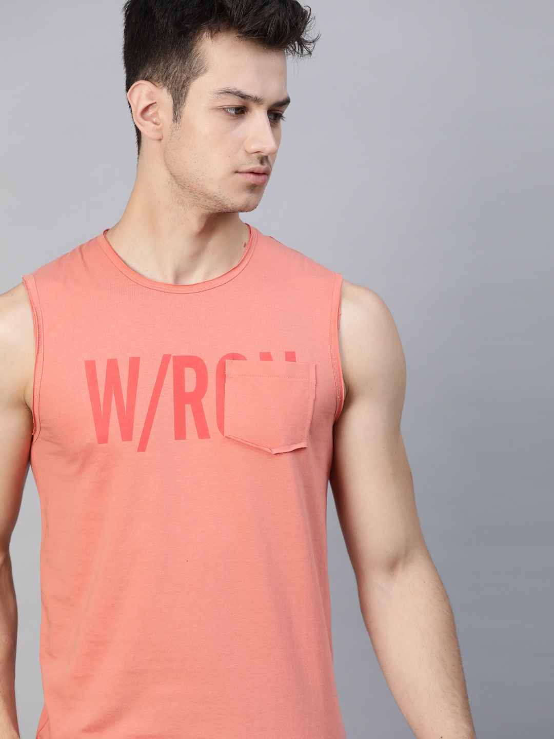 

WROGN Men Peach Coloured Brand Logo Printed Chest Pocket T-shirt