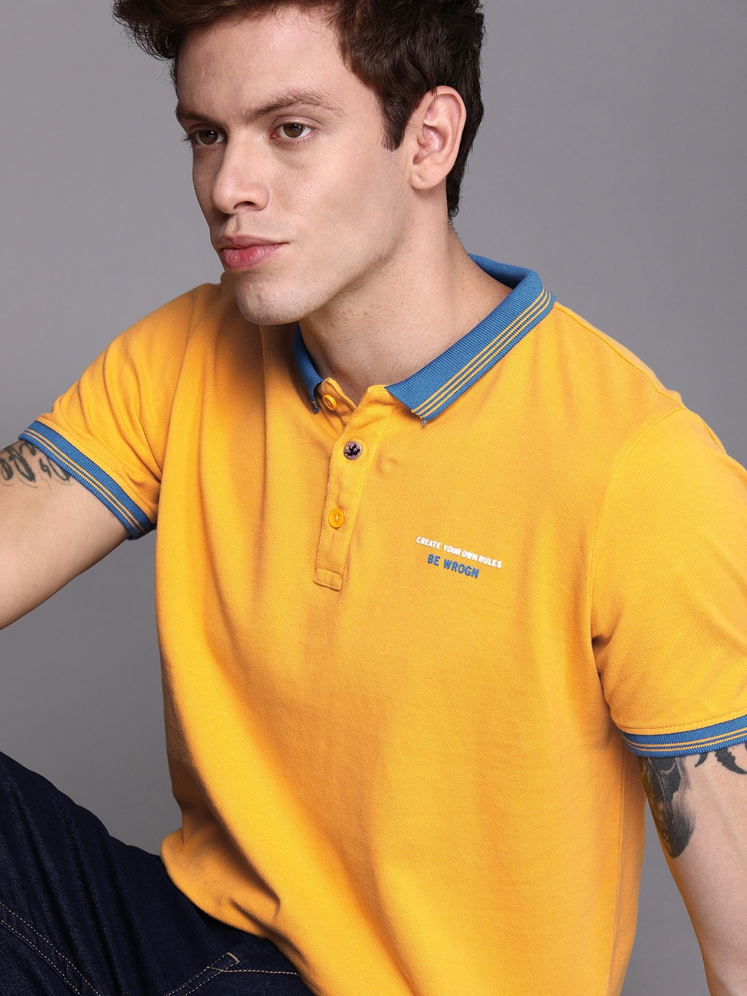 

WROGN Men Yellow Solid Polo Collar Pure Cotton T-shirt