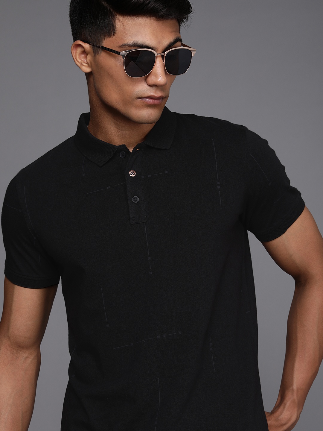 

WROGN Men Black Graphic Printed Polo Collar Slim Fit Pure Cotton Casual T-shirt