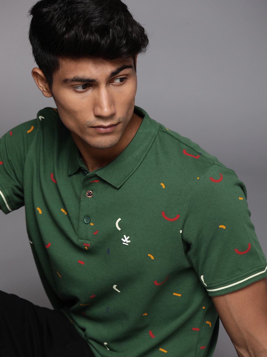 

WROGN Men Teal Green Printed Polo Collar Slim Fit Pure Cotton T-shirt