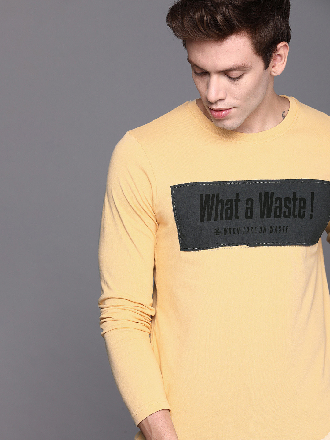 

WROGN Men Yellow Printed Black Slim Fit Round Neck Pure Cotton T-shirt
