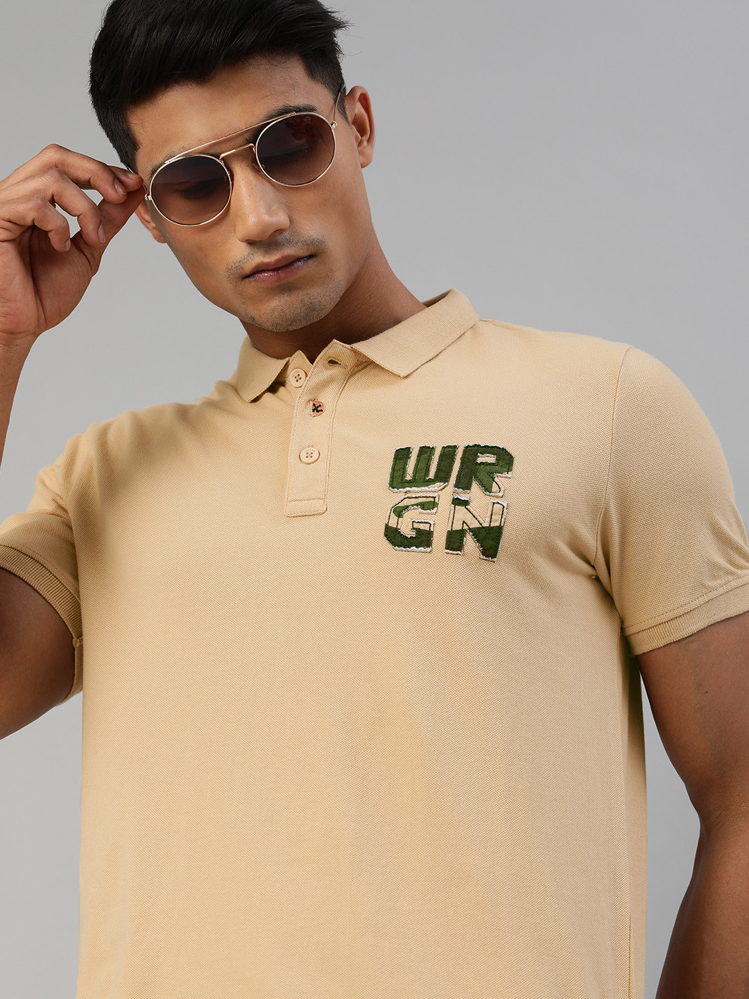 

WROGN Men Cream-Coloured Slim Fit Solid Polo Collar Pure Cotton T-shirt with Applique Detailing