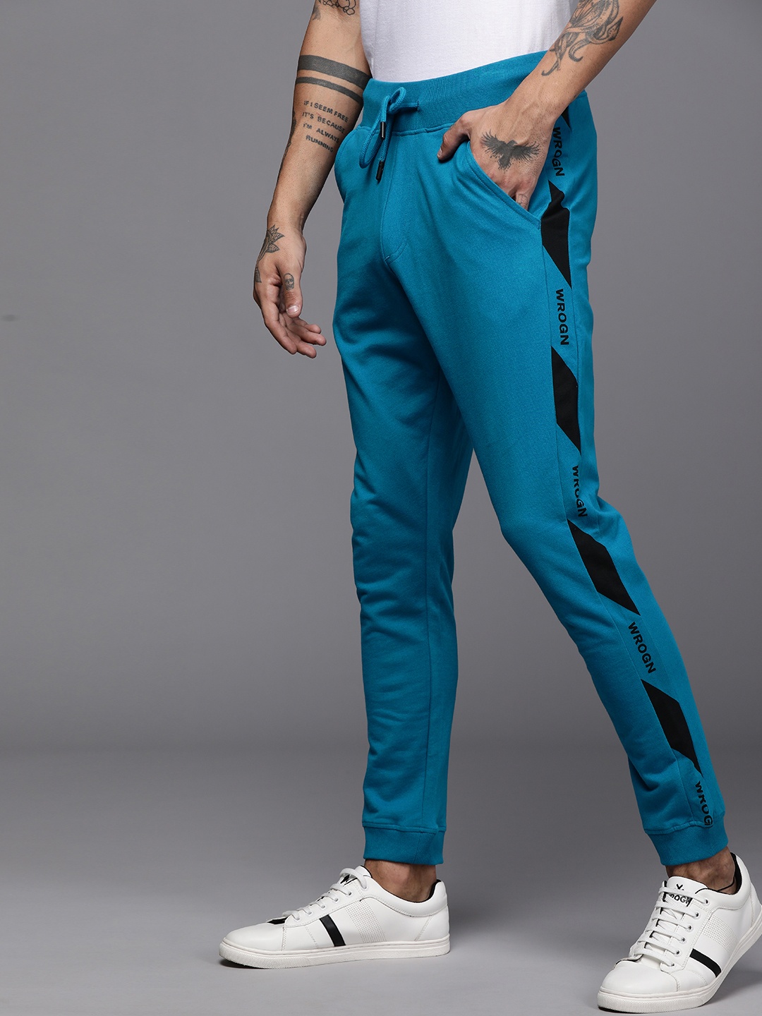 

WROGN Men Teal Blue Slim Fit Solid Joggers with Logo Print
