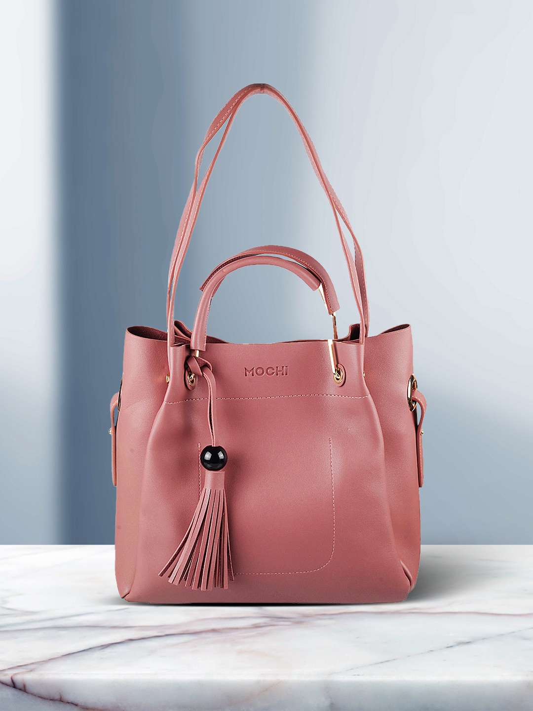 

Mochi Peach-Coloured Solid Handheld Bag