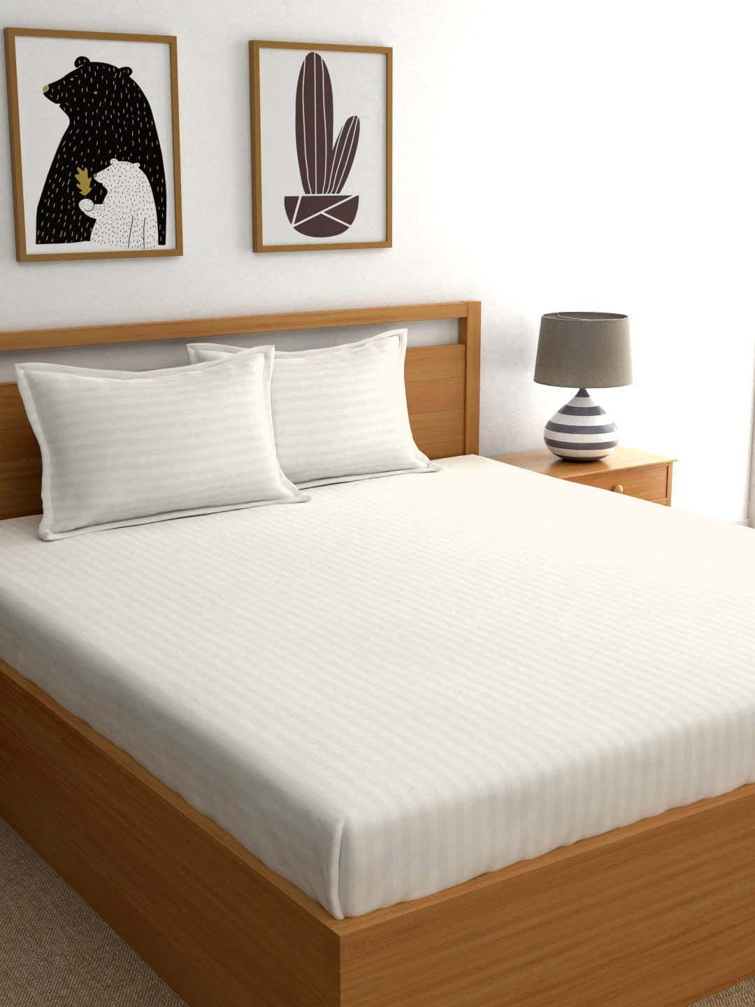 

Ariana Off-White Striped 210 TC Cotton 1 King Bedsheet with 2 Pillow Covers