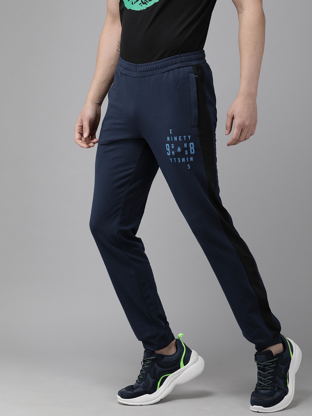 

Wildcraft Men Navy Blue Side Striped with Print Off Active Track 9 Slim Fit Joggers